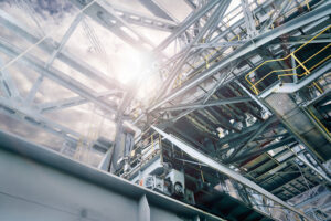 SRC鋼骨混凝土結構的示意圖或實景特寫,強調鋼構彈性與混凝土剛性結合的穩健耐震工藝